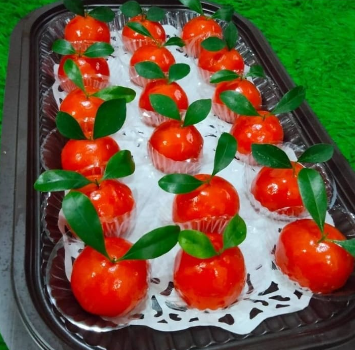 Kue tok jeruk dengan motif cetakan khas